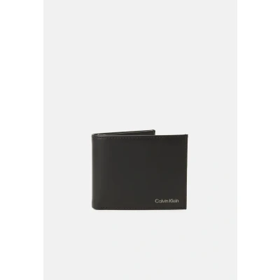 Image of Calvin Klein Men’s Smooth Trifold Leather Wallet, Black (Black), One Size