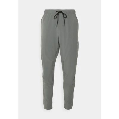 Image of Nike Performance Unlimited TPR Tracksuit bottoms, Men&#039;s, Size: XL, Smoke grey/black/reflective silver