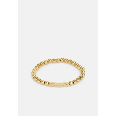 Image of Tommy Hilfiger Jewelry Women&#039;s Beaded Bracelet in Yellow Gold with an Engraved Plaque 2780935