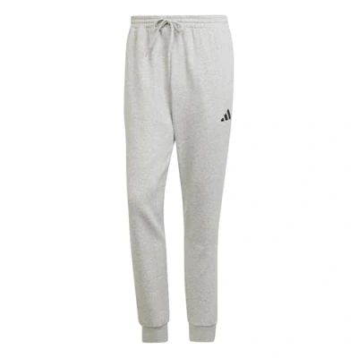 Image of adidas Sportswear Essentials FEEL COZY Tracksuit bottoms, Men&#039;s, Size: XS, Medium grey heather/black