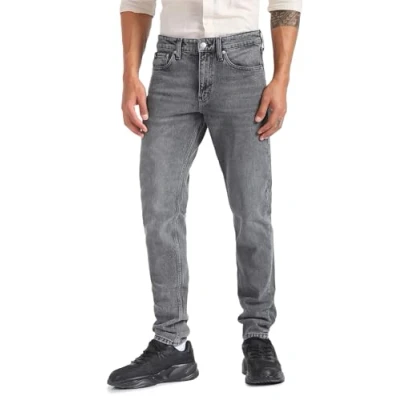 Image of Calvin Klein Jeans Taper Slim fit jeans, Men&#039;s, Size: 29x32, Denim black