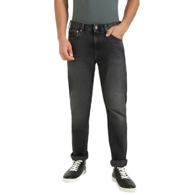 Image of Calvin Klein Jeans Tapered Fit, Men&#039;s, Size: 33x32, Denim black