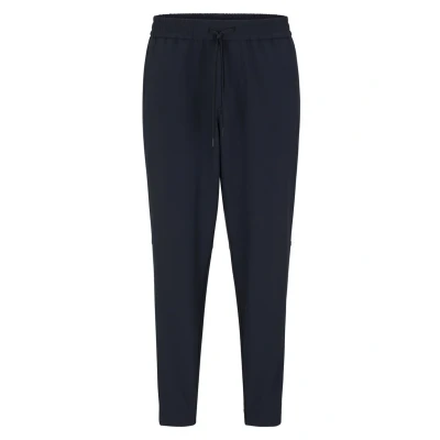 Image of BOSS FLEX Tracksuit bottoms, Men&#039;s, Size: 36L, Dark blue