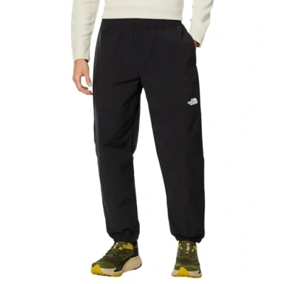 Image of The North Face EASY WIND PANT Tracksuit bottoms, Men&#039;s, Size: Large, Black